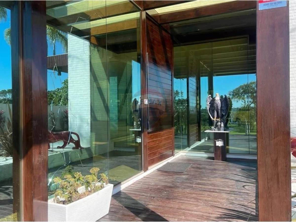 Casa 8 Dormitórios à Venda — Costão Golf Ville, Ingleses